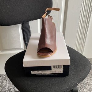 Brown peep toe open back booties